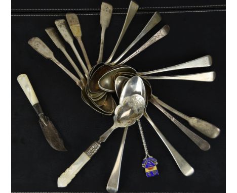 A set of six Georgian silver tea spoons; a set of six Victorian silver fiddle pattern tea spoons; a silver souvenir spoon; tw