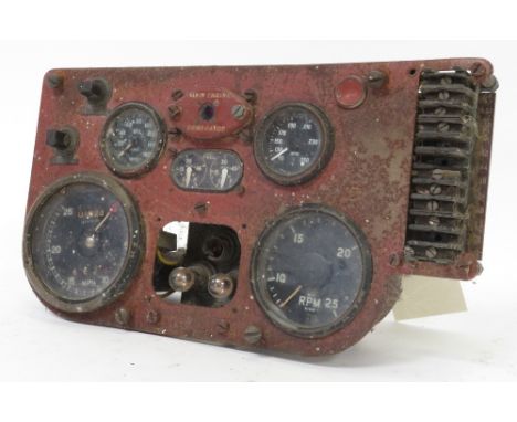 Militaria - a tank drivers console, the metal panel set with speed, RPM, fuel & other dials, approximately 34cm wide max. 