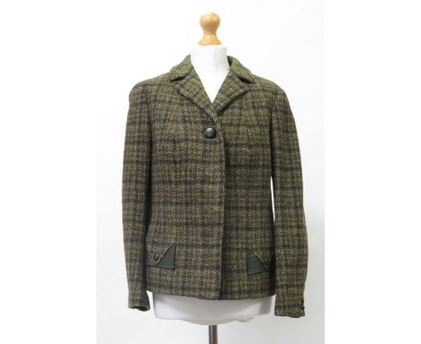 An Alexon two piece suit of jacket and skirt in check pattern; Country Life ladies green tweed jacket, light red coat and a l