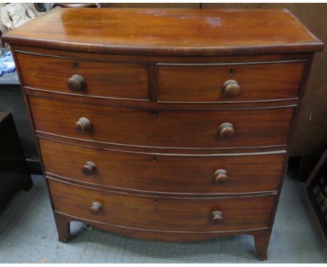 A Victorian mahogany bow front chest of two short and three long drawers on splay bracket supports, 104cm high, 102cm wide