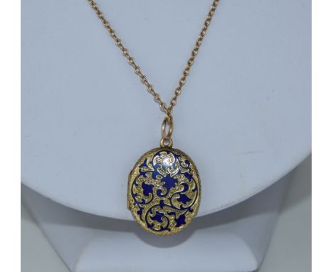 An oval locket with blue enamel decoration; on a chain