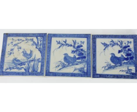 Three Chinese blue and white ceramic tiles, two painted with quail the other with Mandarin duck and drake, approximately 6cm 