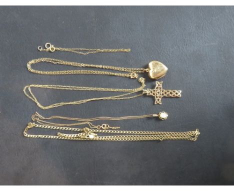 A 9ct gold celtic cross on a chain; an opal pendant on a chain; a 9ct gold chain; and a heart locket on a chain