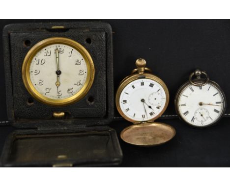 A travelling clock; a silver open faced pocket watch; and a gold coloured pocket watch