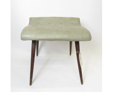 A circa 1950/1960's stool having rectangular leatherette covered top with button detail to slightly raised back and of four t