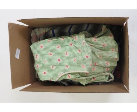 Eight childrens dresses circa 1950's/1960's includes colourful printed cotton with button & lace detail, light grey wool, red