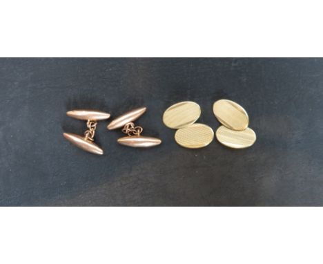 A pair of 9ct gold cufflinks, the oval engine turned panels with chain connectors Chester 1936; with a pair of 9ct gold cuffl