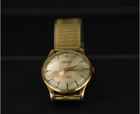 Nivada, a 9 carat gold gentleman's automatic wrist watch, the white dial with gilt batons, hands and sweep seconds hand, the 