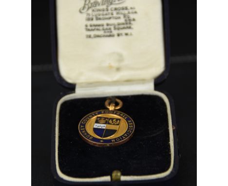 A 9 carat gold and enamel presentation medal from the Surrey County Football Association, Senior Cup Winner 1936-37, cased, 9