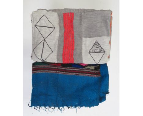 A 1950's/1970's cotton throw woven with geometric patterns within red and orange lines, reversible; together with a double be