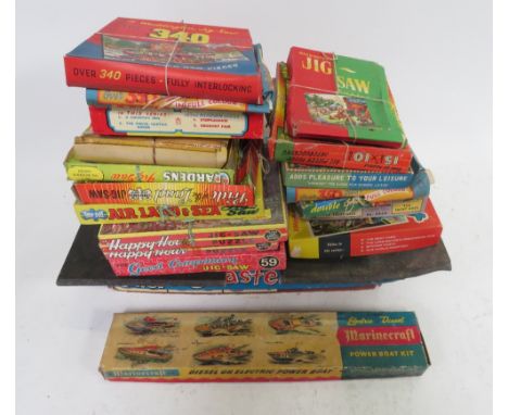 A Chad Valley Mah-Jong set with instructions; Waddingtons boxed board game Buccaneer together with other games, jigsaws & pow