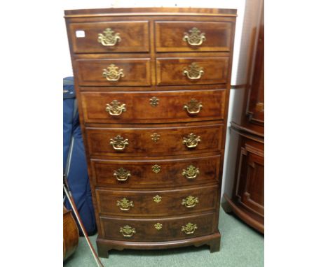 Good Quality Reproduction chest of 4 over 4 drawers with brass drop handles and bracket feet, Height 142cm Width 76cm Conditi