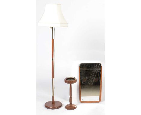 A mid Century framed mirror, 70 x 39cms; a smoker's stand and glass ashtray, 51cms high; and a teak and brass-bound lamp stan