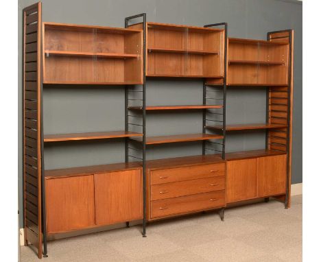 Ladderax by Staples &amp; Co. Ltd: a mid 20th Century teak wall unit, comprising cabinets with glazed and solid doors, three 