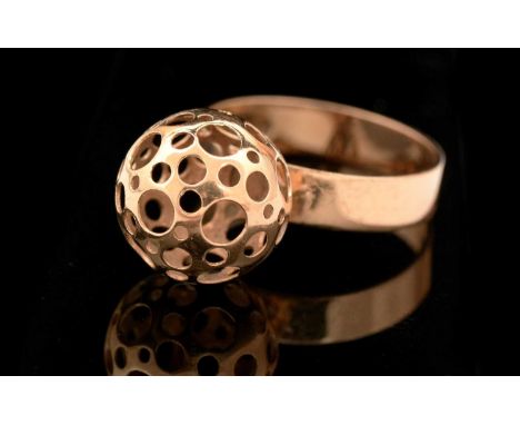 Liisa Vitali for Nestor Westerback Oy, ‘Ladybird’ ring, 1969, 14ct gold, the pierced orb on plain band, ring size K.