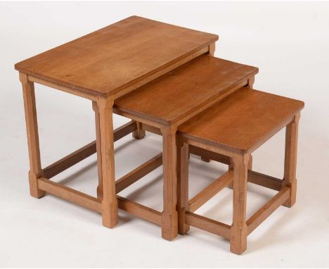 Workshop of Robert 'Mouseman' Thompson of Kilburn: a nest of three occasional tables, with adzed tops, carved mouse trademark