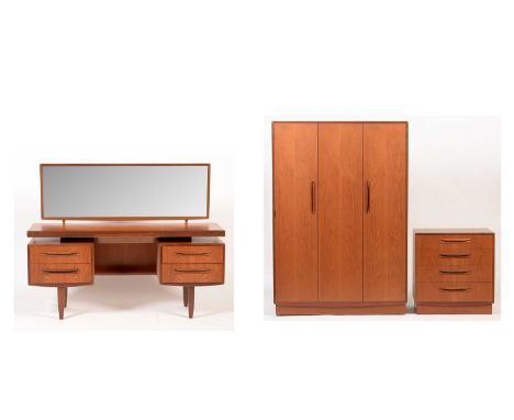 G-Plan: a teak 'Fresco' three-piece bedroom suite, comprising: a wardrobe, 122 x 58 x 176cms high; a dressing table, 152 x 45