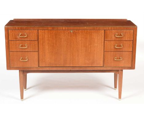 A mid 20th Century mahogany sideboard, rectangular, fitted with drinks compartment, cutlery drawers and other drawers, on tur