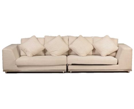 Eichholtz: a Marlon Brando sofa, in polyester and linen, Panama natural colour with polished stainless steel base, loose back