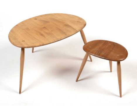 Ercol: two from a set of three beech and elm 'Pebble' tables, the larger 64 x 43 x 40cms high, the smaller 34 x 24 x 32cms hi