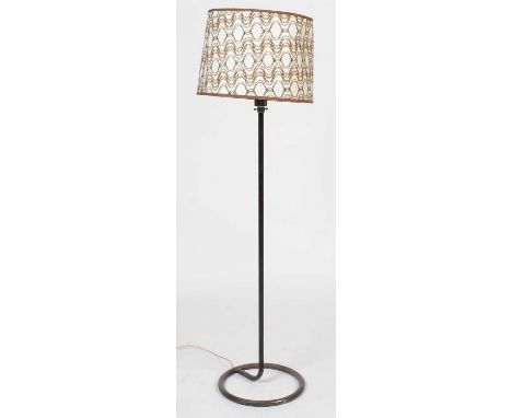 A mid-20th Century wrought and chromed metal lamp standard, with a backed needlework shade, 158cms high.