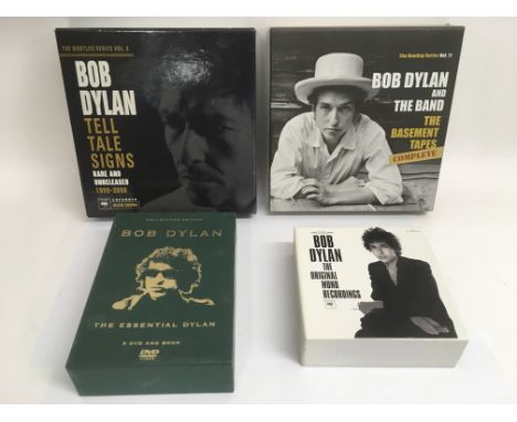 Four Bob Dylan CD box sets comprising 'The Original Mono Recordings', 'The Essential Dylan - 5DVD and book' plus two others..