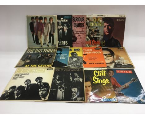 A record box mainly EPs by various artists including The Rolling Stones, Elvis Presley, The Big Three and others plus two dem