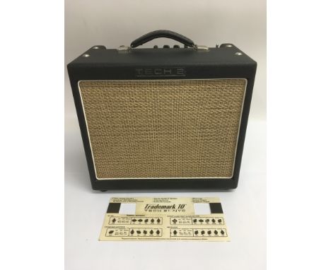 A Tech 21 Trademark 10 guitar amplifier with original retail insert and amp cover.