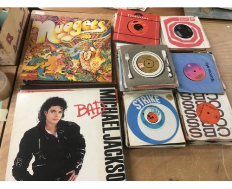 A collection of LPs and7inch singles by various artists including Michael Jackson, The Rolling Stones, Badfinger and others.