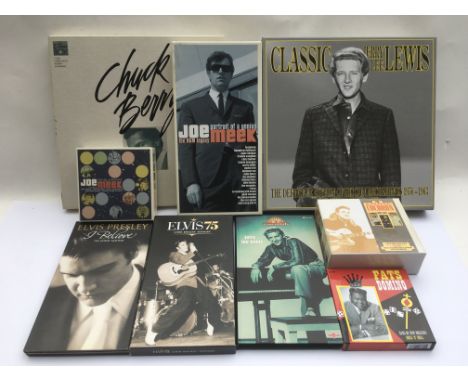 A collection of Rock'n'Roll artist CD box sets comprising Chuck Berry, Eddie Cochran, Elvis Presley and others.