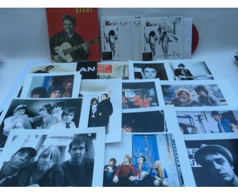 A box containing Bob Dylan fanzines, Babyshambles singles, publicity photos of various band and related ephemera.