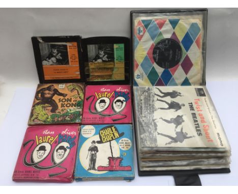 An album of 7 inch singles and EPs including The Beatles and Frank Sinatra plus six 8mm film reels including Laurel &amp; Har