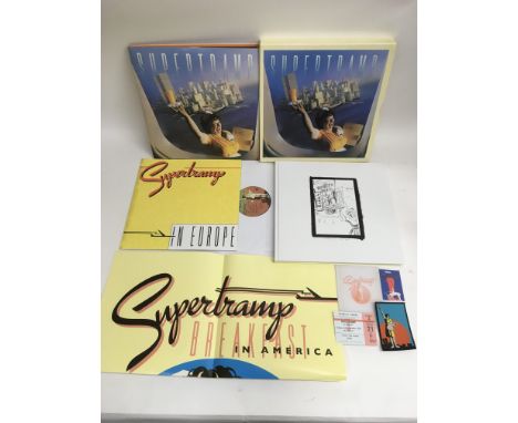 A Supertramp 'Breakfast In America' LP/CD/DVD box set complete with hard back book, poster, replica ticket and inserts.