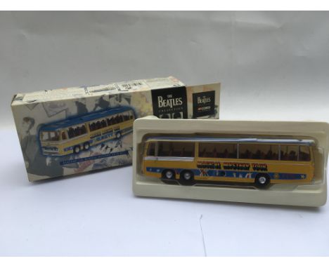 A boxed Corgi Magical Mystery Tour bus.