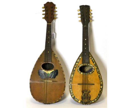 Mandolin label read 'Elsbetha', requires work to be put in playing condition, decorative mother-of-pearl inlay around belly a