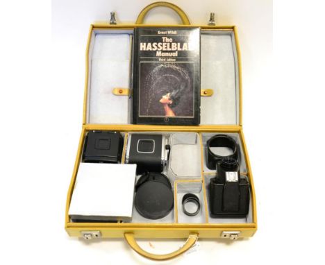 Hasselblad Accessories including 2xA12 6x6 film backs, prism viewer, filter and The Hasselblad Manual (Third Edition), in man