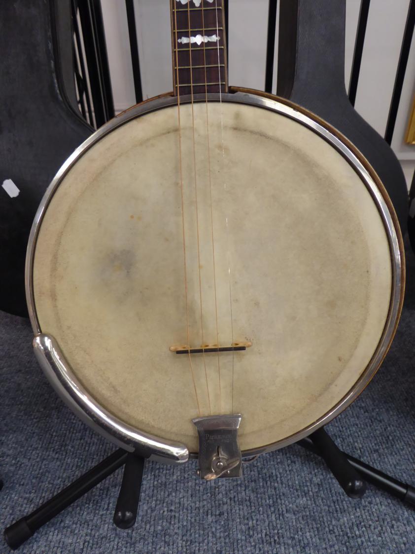 Banjo four string,11'' diameter head, wooden resonator, decorative
