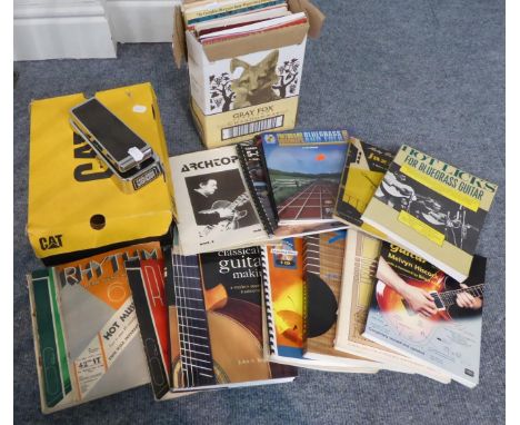 Carlsbro Wah-Wah Pedal together with approximately 30 books and eight VHS videos on stringed instrument playing and construct