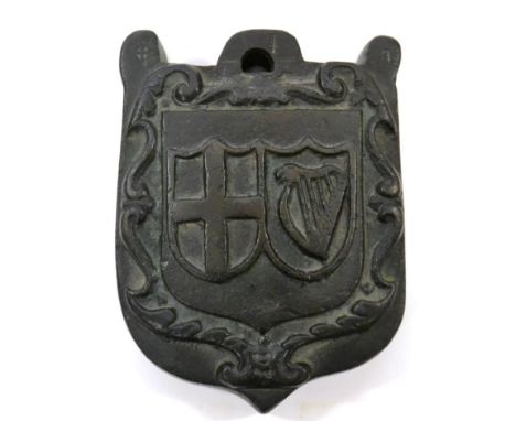 Wool Weight bronze, cast in relief with harp and cross in shields, three cyphers to top: cross in shield, dagger and A 19cm h