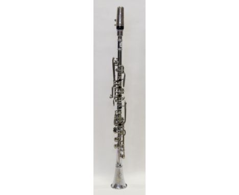 Hawkes & Son Metal Simple System Clarinet, inscription reads 'XX Century, Hawkes & Son, London', two piece body measures 23.2