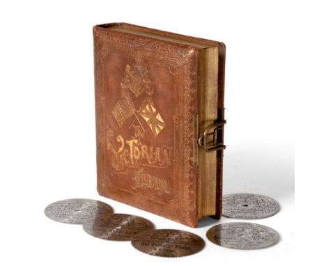 Disc Music Box In The Form Of 'The Victorian Album' Book playing 4.5'' discs (with five additional discs inside front cover) 