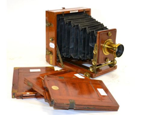 J Lancaster The 1893 Instantograph Half Plate Camera with unmarked brass lens with iris aperture, mahogany body with brass fi