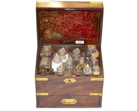 Apothecary Chest mahogany with brass fitting including shield to lid and handles either side; top section with 18 spaces for 