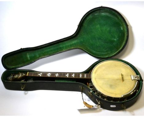 Banjo four string,11'' diameter head, wooden resonator, decorative mother of pearl to headstock fingerboard with decorative i