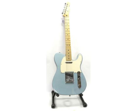 Fender Telecaster Made in Mexico, serial number MZ2196871, metallic light blue with white scratchplate, two control dials, th