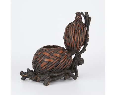 Japanese woven bamboo double gourd form ikebana basket nested on a gnarled twig base, Meiji to Taisho period.Height: 12 1/2 i