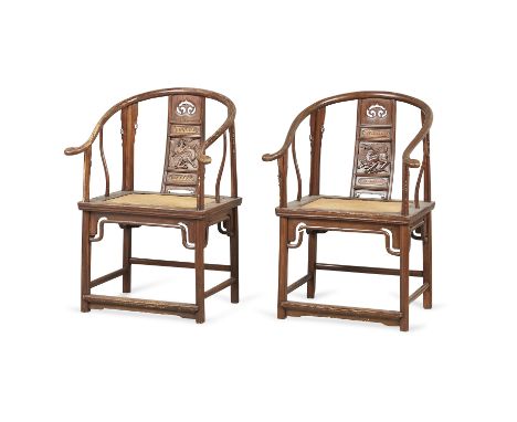 Pair of rare mid-19th century Chinese elm wood horseshoe back quanyi chairs. Each with a U-form crestrail. Each with a carved