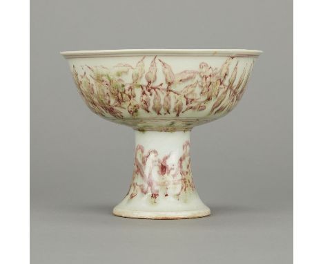 Chinese late Qing Dynasty porcelain bowl with a high foot. Decorated in green and red with scrolling floral and foliate motif