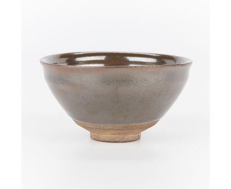 Antique Chinese ceramic bowl with a dark brown glaze and oil spot along the interior. Similar to a tea dust glaze.Height: 2 1