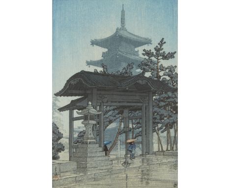 Hasui Kawase (Japanese, 1883-1957). Japanese woodblock print titled "Zenetsu Temple in the Rain" depicting a temple with seve